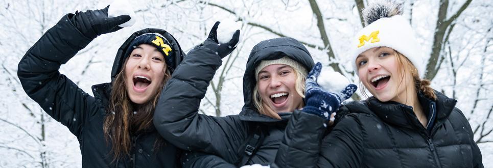 three girls in snowball fight 